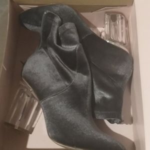 Gray soft material ankle boots with clear heel
